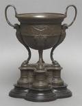 A Neoclassical Style Bronze Urn on Stand