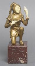 A Bronze Figure of a Jester