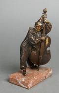 A Gilt Bronze Figure of a Clown