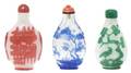 A Group of Three Peking Glass Snuff Bottles