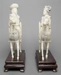 A Pair of Ivory Figures of an Emperor and Empress on Horseback