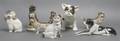 A Set of Eight Porcelain Figures of Dogs