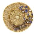 An 18 Karat Yellow Gold Blue Sapphire and Diamond Pin