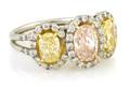 A Platinum and 18 Karat Yellow Gold Natural Light Pink and Fancy Light Yellow Diamond Ring
