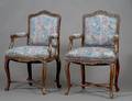 SET OF EIGHT LOUIS XV PROVINCIAL STYLE ARM CHAIRS