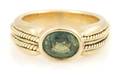 An 18 Karat Yellow Gold and Green Tourmaline Ring