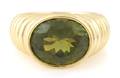 An 18 Karat Yellow Gold and Peridot Ring