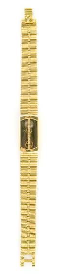 An 18 Karat Yellow Gold Wristwatch Corum Golden Bridge