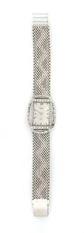 A 14 Karat White Gold and Diamond Wristwatch Longines