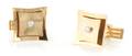 A Pair of 14 Karat Yellow Gold and Diamond Cufflinks