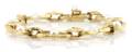 An 18 Karat Yellow Gold and Pearl Bracelet