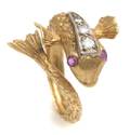 An 18 Karat Yellow Gold Diamond and Ruby Fish Ring