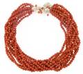 A 14 Karat Yellow Gold Diamond and Red Coral Multistrand Necklace