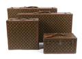 A Group of Four Louis Vuitton Travel Cases