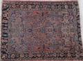 A Group of Two Sarouk Rugs