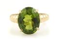 A 14 Karat Yellow Gold and Peridot Ring