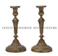 A Pair of Louis XVI Style Bronze Candlesticks
