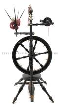 A German Ebonized Oak Spinning Wheel