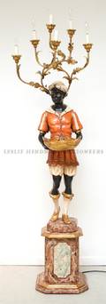 A Continental Carved Wood Blackamoor SixLight Candelabra