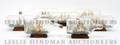 A Collection of Seven Miniature Ships in Bottles
