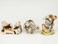 GROUP OF THREE CARVED AND POLYCHROMED IVORY NETSUKES