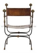 A Renaissance Revival Iron Brass and Leather Armchair