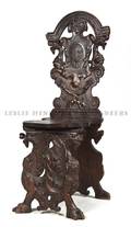 A Renaissance Revival Carved Hall Chair