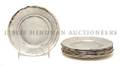A Set of Eleven Peruvian Silver Bread Plates Welsch