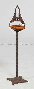 An American Art Deco Cast Iron Smoking Stand