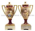 A Pair of Royal Vienna Style Handled Urns