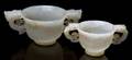 A Group of Two Chinese Double Handled Jade Cups