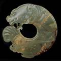 A Chinese Archaistic Style Carved Jade Bi