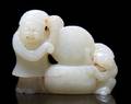 A Chinese Carved Jade Figural Group