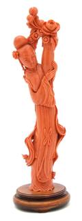 A Chinese Carved Coral Figure