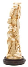 A Japanese Ivory Figural Group
