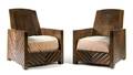 A Pair of French Art Deco Style Oak Lounge Chairs
