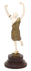 A French Art Deco Bronze and Ivory Figure After L Bartholemey
