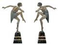 A Pair of Art Deco Cast Metal Figures