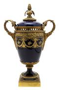 A Sevres Style Gilt Bronze Mounted Urn