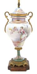 A Sevres Porcelain and Metal Mounted Urn