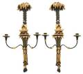 A Pair of Italian Painted and Parcel Gilt Figural TwoLight Sconces