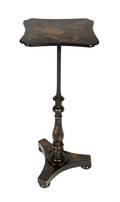 A Regency Style Lacquered Candlestand
