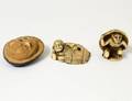 THREE CARVED IVORY NETSUKES