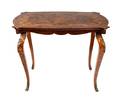 A Louis XVI Style Marquetry and Gilt Metal Mounted Occasional Table