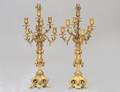 PAIR OF SEVEN LIGHT BRONZE CHERUB CANDELABRAS