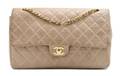 A Chanel Beige Quilted Leather Purse