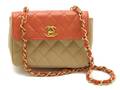 A Chanel Red and Beige Quilted Leather Purse