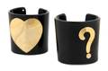 A Set of Two Moschino Black Cuffs
