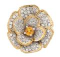 A 14 Karat Two Tone Gold Yellow Sapphire and Diamond Ring