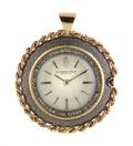 A 14 Karat Yellow Gold and Platinum Watch Pendant Audemars Piguet